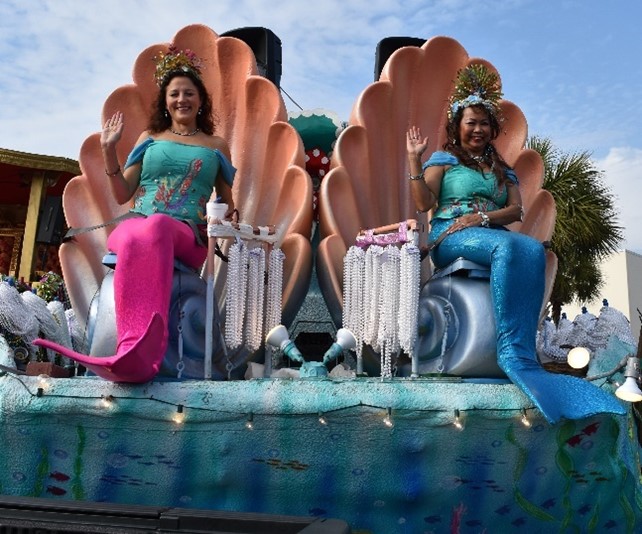 The Mermaids of the Krewe of Dominique Youx present the “Jewels of the Sea”. parade float